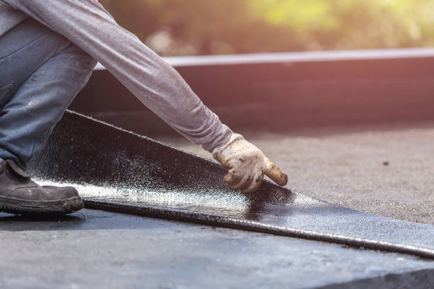 Professional Basement Waterproofing technician working in Valley Center, KS